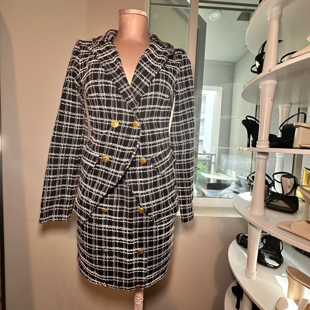 Amazon tweed blazer and skirt set.